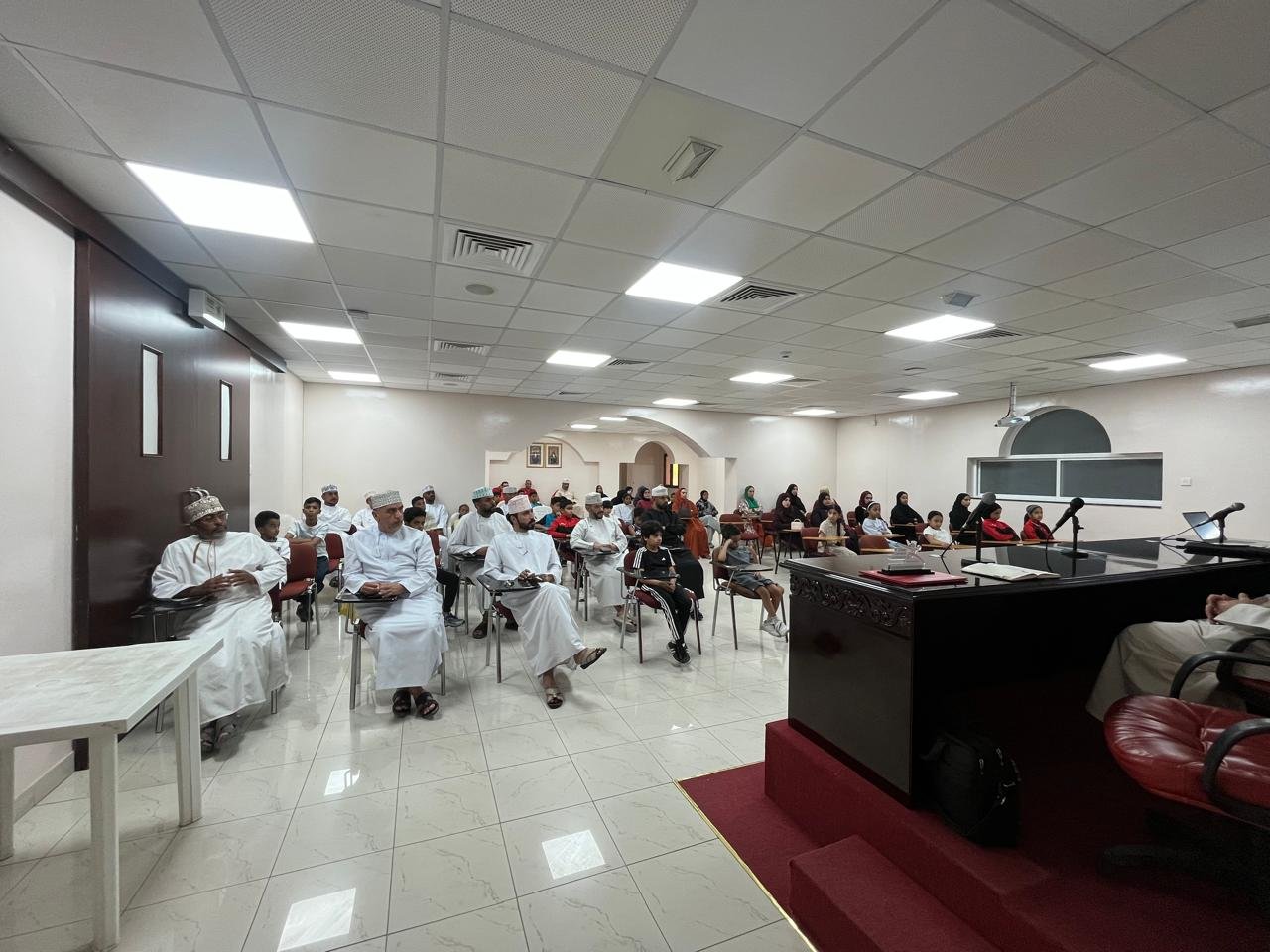 Athletes and parents in the audience during the nutrition awareness lecture at the Seeb Sports Stadium